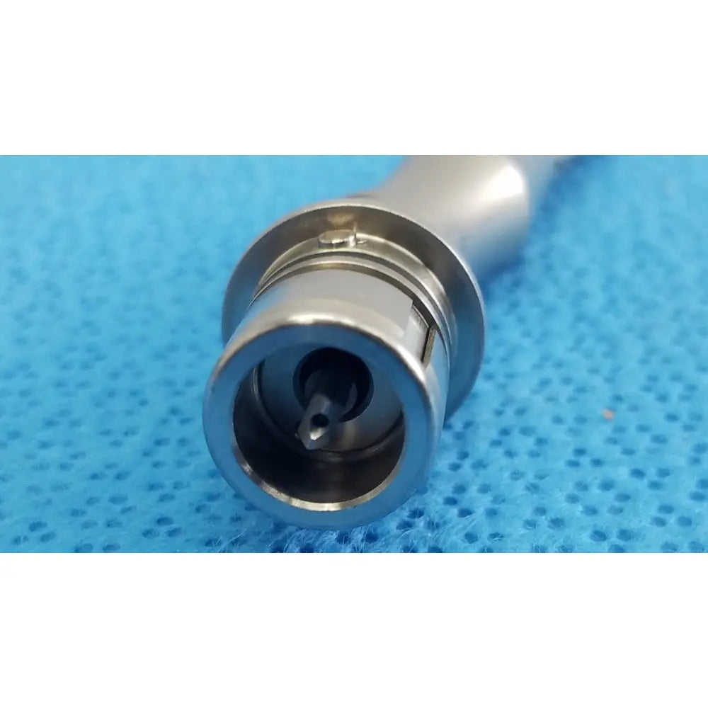 Silver surgical angled saber portmann chuck with polished metallic finish and precise mechanical components from stryker series