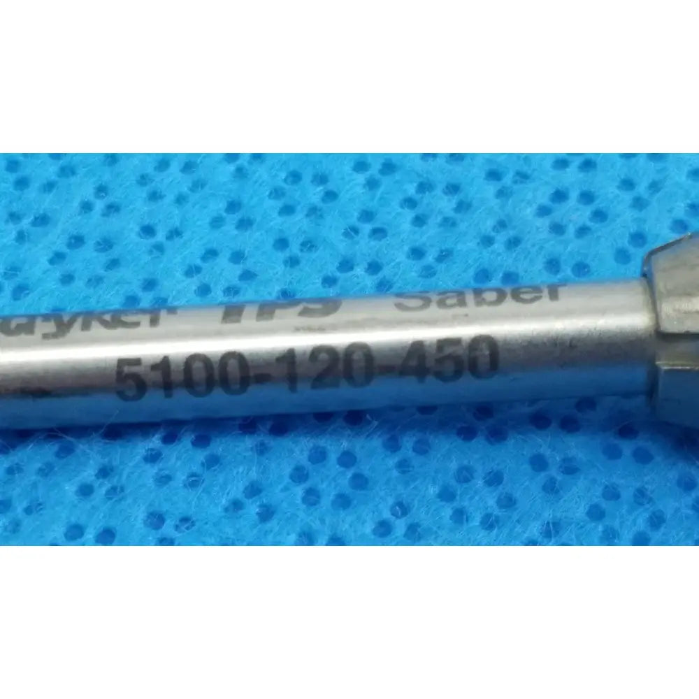 Silver-colored metal tsp saber straight surgical instrument with engraved saber and model number 5100-120-450