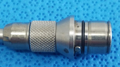Silver-colored metal tsp saber straight attachment with textured knurled grip and smooth cylindrical body by Stryker