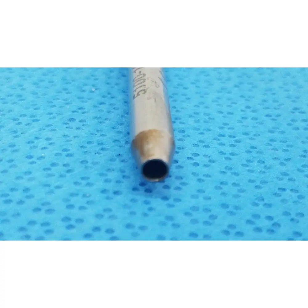 Metallic cylindrical stryker 5100-120-452 tsp saber drill with worn finish and engraved markings for reuse medical applications