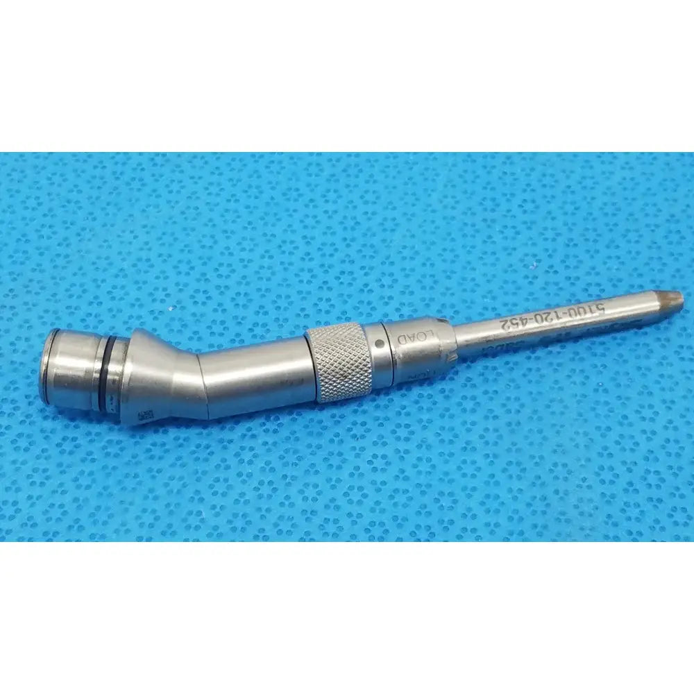 Silver stainless steel tsp saber drill with textured grip and engraved markings for surgical use by stryker