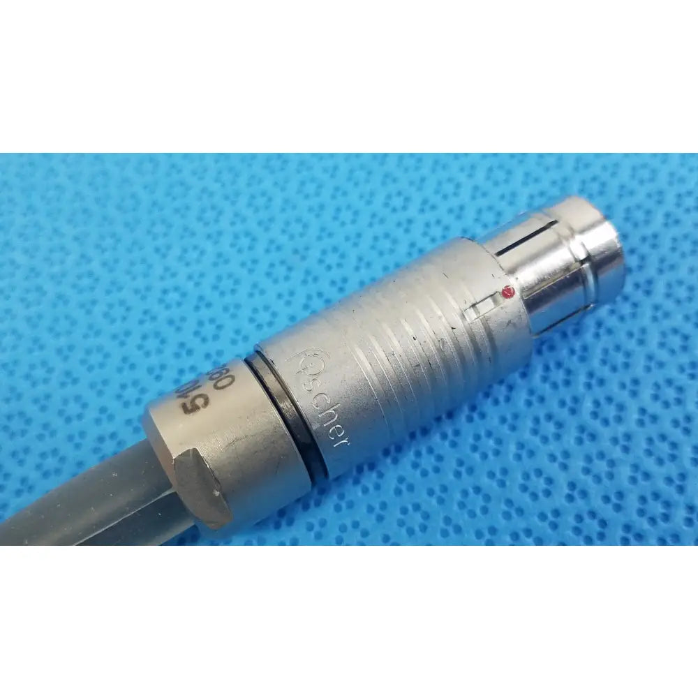 Silver metallic röcher brand threaded connector with engraved markings for reuse medical equipment scher handpiece cable