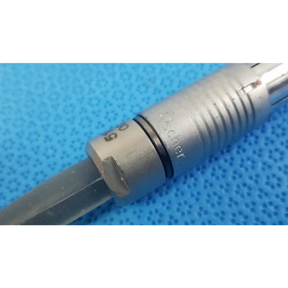 Silver-colored metal scher handpiece cable with engraved oscher branding and ribbed grip for reuse medical equipment