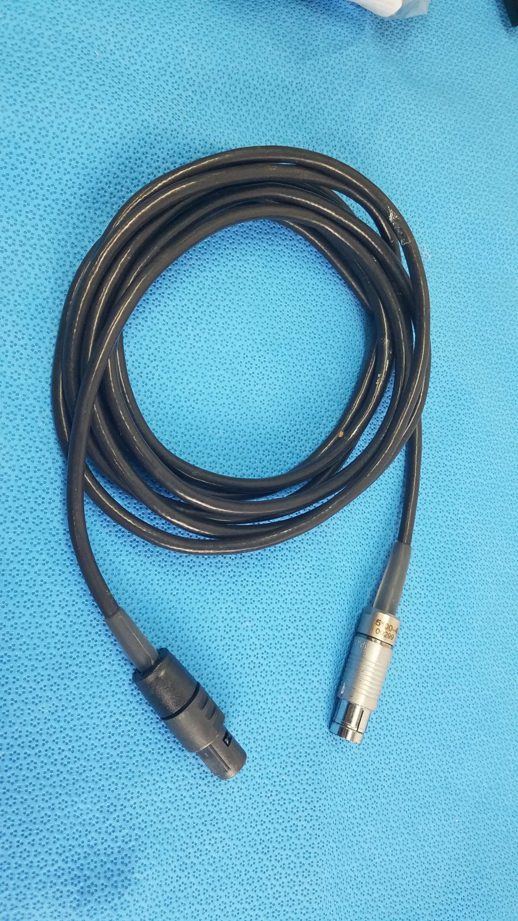 Stryker 5100-4 scher handpiece cable with black coiled sheath and metallic xlr male to 3.5mm trs jack for medical equipment reuse