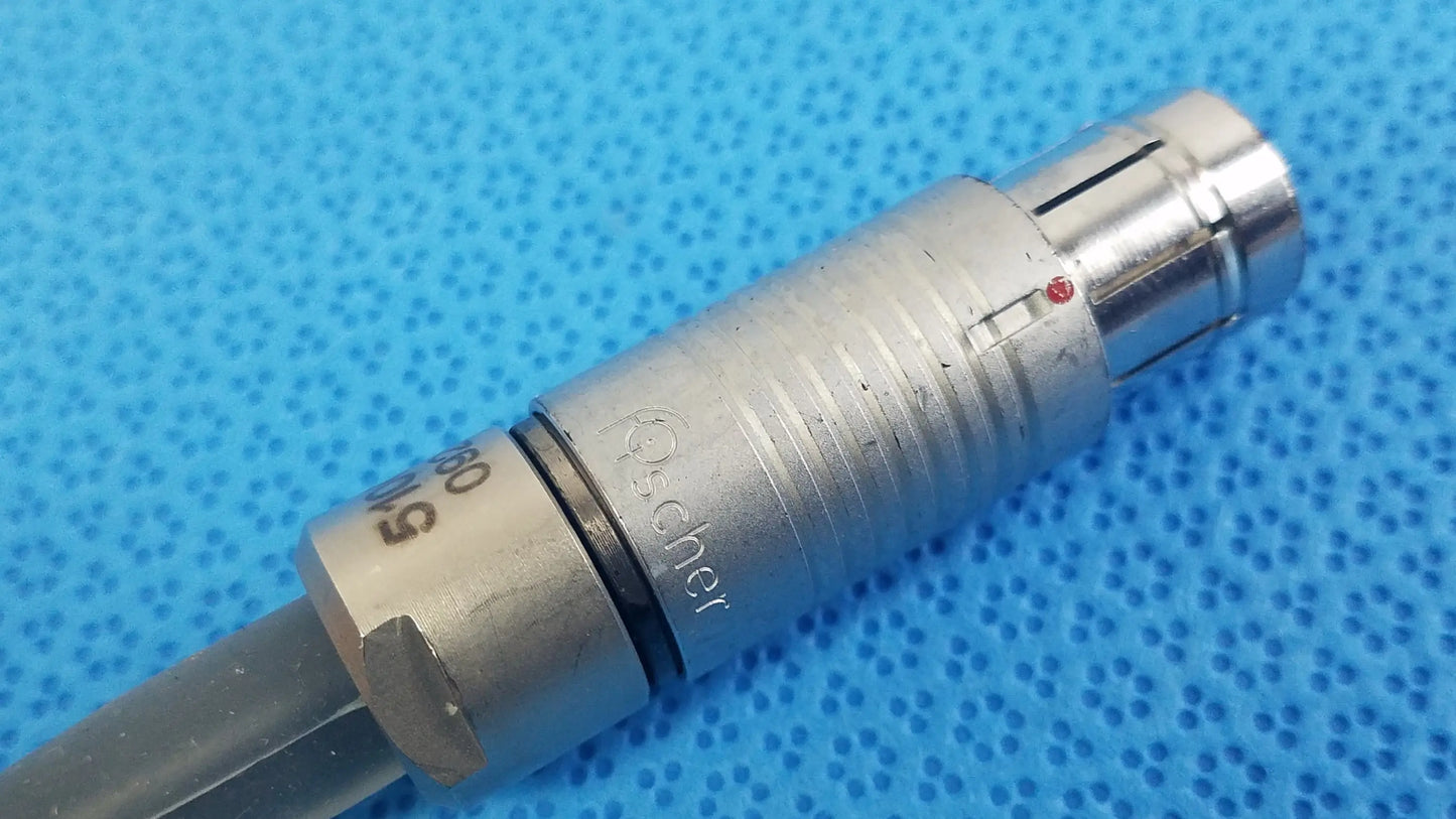 Silver metallic röcher brand threaded connector with engraved markings for reuse medical equipment scher handpiece cable