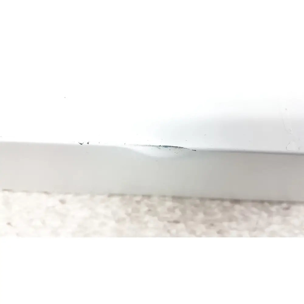 White plastic baseboard with minor scuff marks and dark smudge near center for stryker 5400-50 core powered instrument driver surgical handpiece