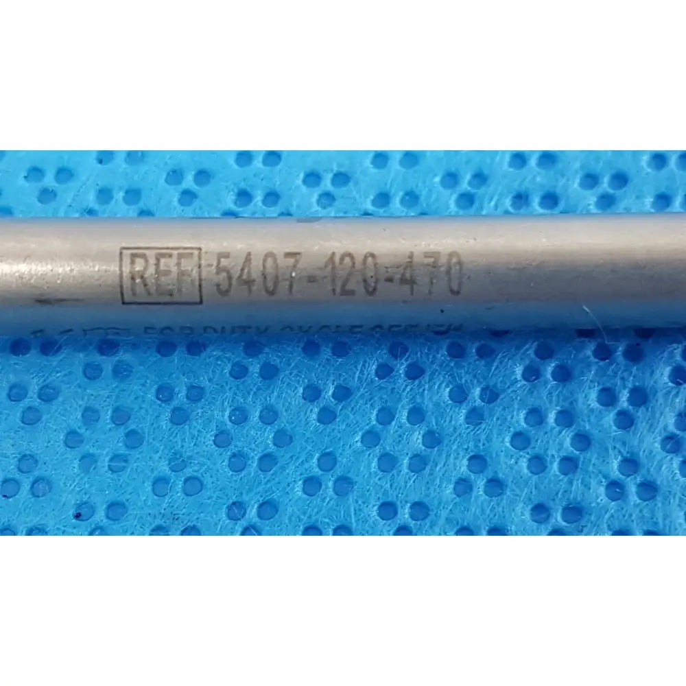 Silver-colored metal surgical power tool rod with engraved ref 5407-120-470 for stryker maestro attachment