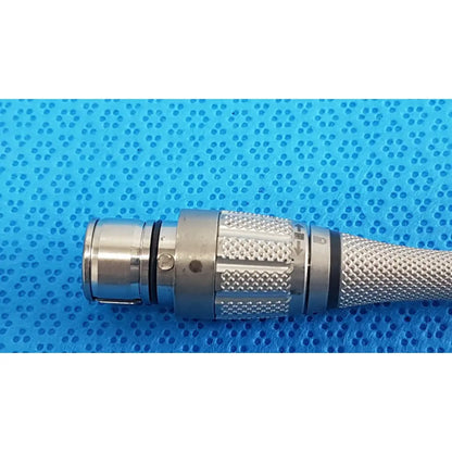 Silver metallic maestro attachment surgical power tool connector with textured grip and threaded locking mechanism