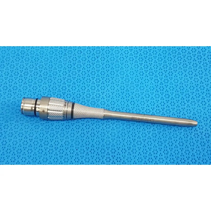 Silver stryker maestro attachment surgical power tool component with textured grip and engraved markings