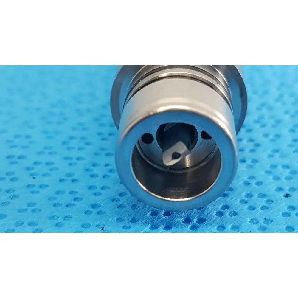 Silver metallic surgical drill bit with threaded shank and three holes for stryker maestro attachment surgical power tool component