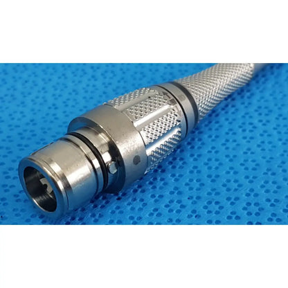 Silver metallic maestro attachment connector with knurled grip and threaded barrel for surgical power tool use