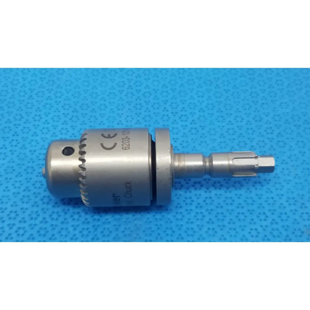 Stryker 620-131-000 silver metallic keyed chuck with textured grip and engraved markings for reuse medical use