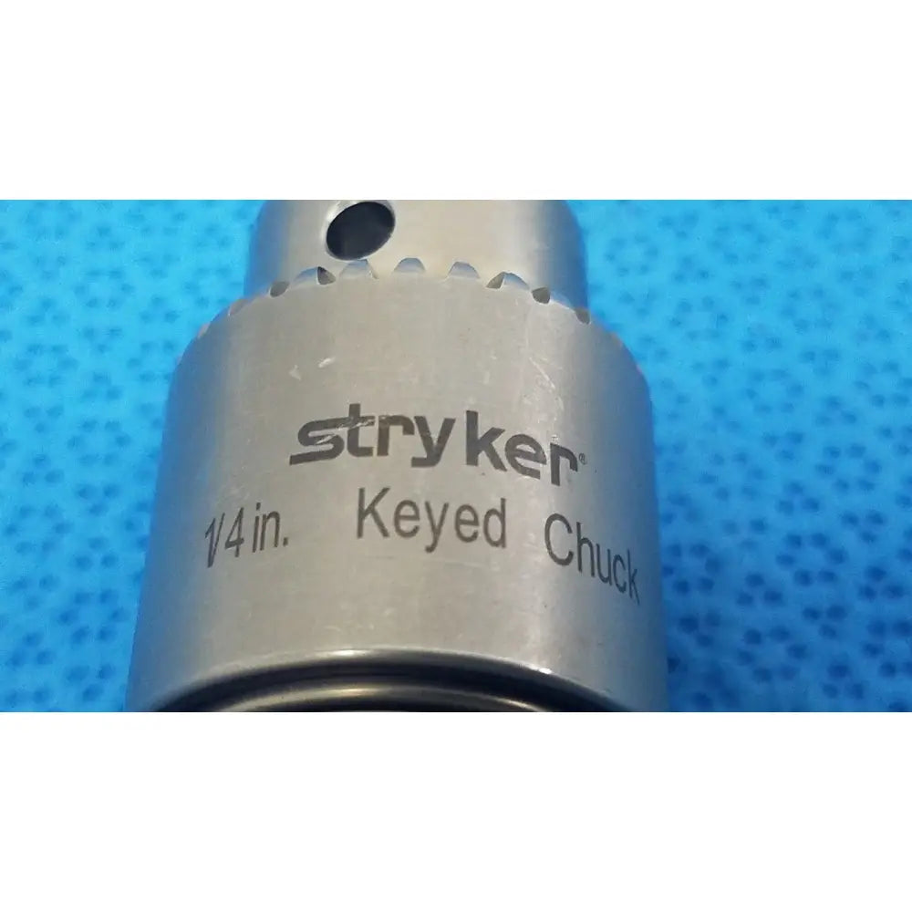 Silver stryker 1/4 inch keyed chuck with toothed edge and engraved branding for reuse medical applications