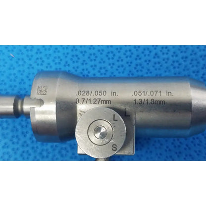Silver metallic Stryker 6203-026 adjustable wire collet with engraved dimensional markings for reuse medical applications