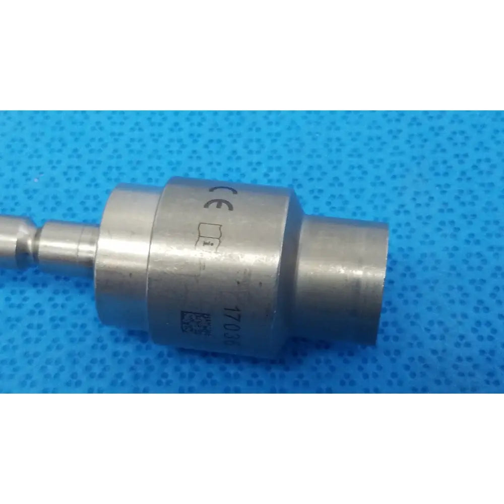 Silver metallic hudson modified trinkle surgical attachment with cylindrical body, threaded ends, and ce certification