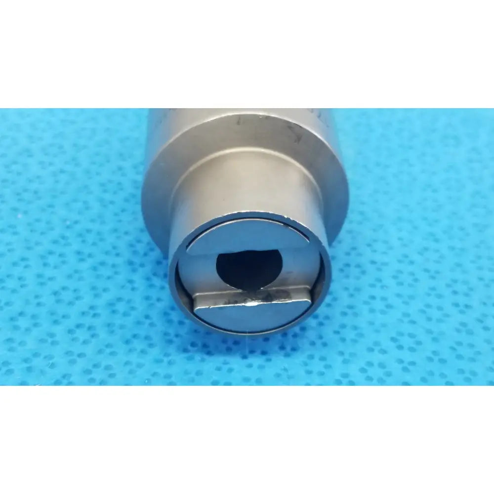 Silver-colored metal cylindrical Stryker 6203-113-000 Hudson tool with circular opening and flat rectangular insert for reuse medical use