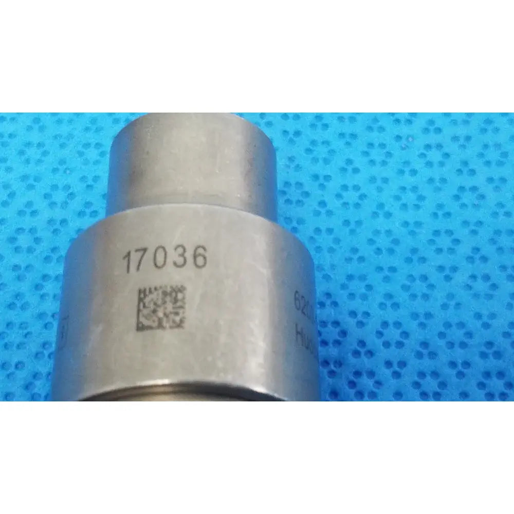 Silver metallic cylindrical component with engraved number 17036 and qr code for reuse medical stryker 6203-113-000 hudson