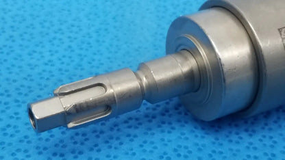 Stryker 6203-113-000 silver metallic dental handpiece with hexagonal drive end and machined grooves for reuse medical use