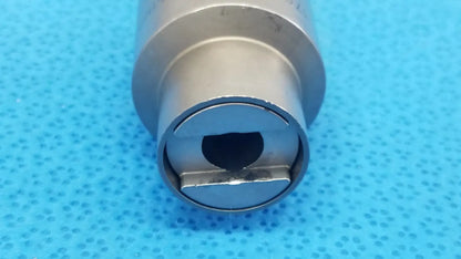 Silver-colored metal cylindrical Stryker 6203-113-000 Hudson tool with circular opening and flat rectangular insert for reuse medical use