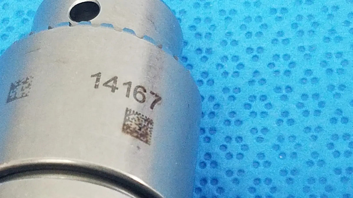 Silver metallic stryker 6203-131-000 1/4 keyless chuck with serial number and qr code for reuse medical use