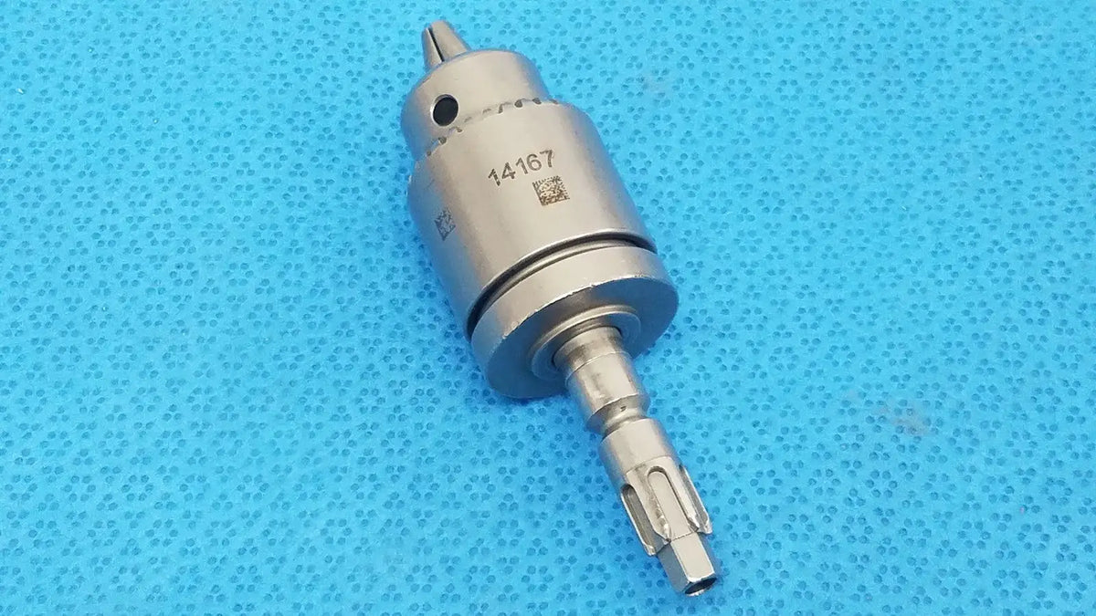 Silver surgical drill bit with textured metallic finish and engraved serial number 14167 for stryker 6203-131-000 keyless chuck reuse medical use
