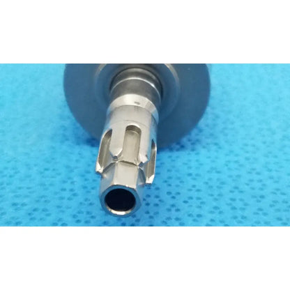 Silver metallic keyed chuck with cylindrical shaft and gear-like cutouts for reuse medical applications, stryker 6203-131