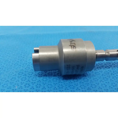 Silver metallic hudson modified trinkle surgical attachment with engraved markings on cylindrical body by Stryker