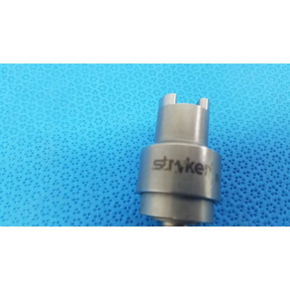 Silver metallic stroker tool with cylindrical body and two top notches for Stryker 6203-135 hudson modified trinkle attachment