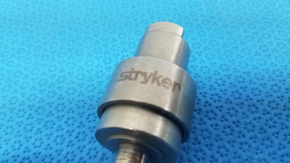 Silver metallic stryker hudson modified trinkle surgical instrument with cylindrical body and engraved branding for reuse medical use