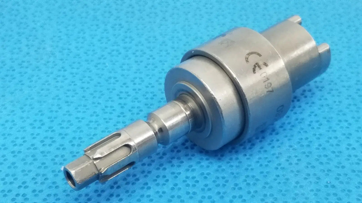 Silver metallic surgical drill bit with cylindrical body and fluted cutting tip for reuse medical hudson modified trinkle