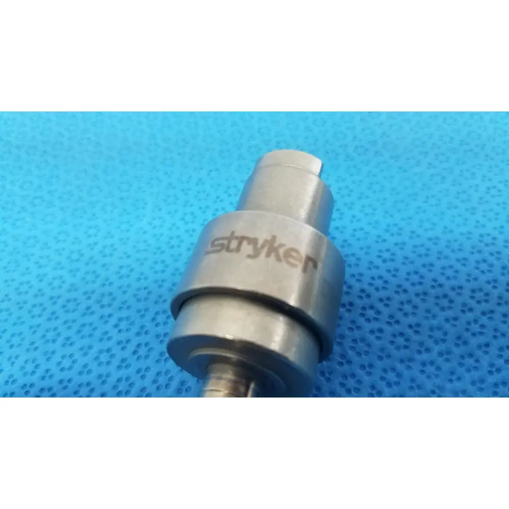 Silver metallic stryker hudson modified trinkle surgical instrument with cylindrical body and engraved branding for reuse medical use