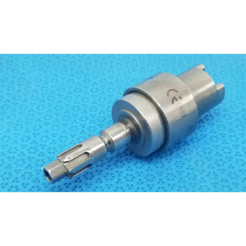 Silver metallic surgical drill bit with cylindrical body and fluted cutting tip for reuse medical hudson modified trinkle