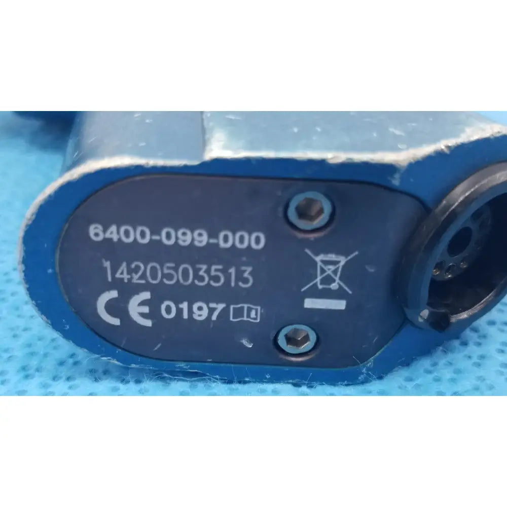 Blue industrial hydraulic valve with matte finish and engraved part number 6400-099-000 for remb universal driver