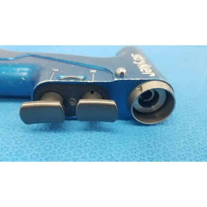 Blue snyder universal driver with metallic accents and dual adjustment knobs for reuse medical applications