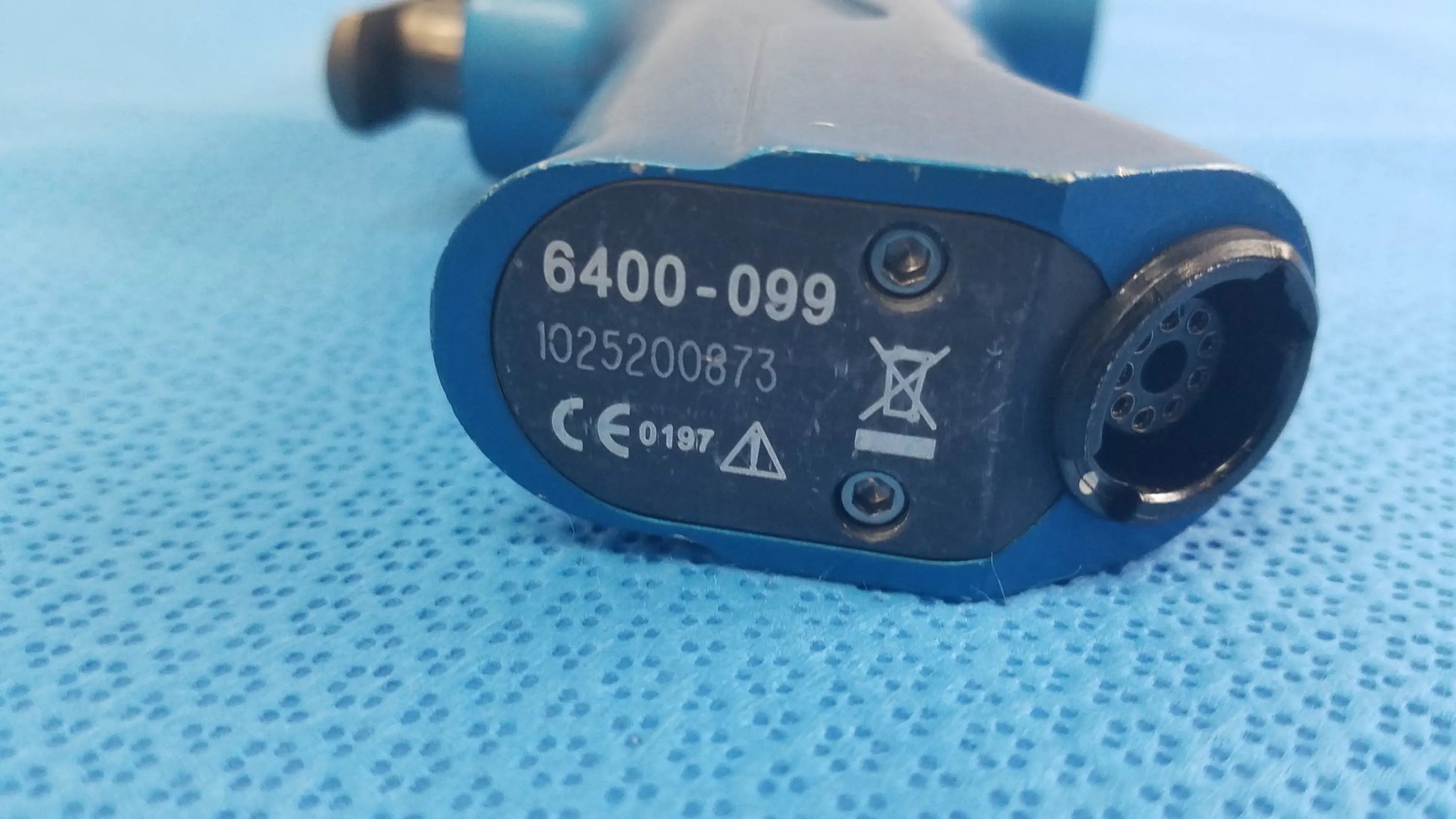 Blue and gray industrial air tool with model number 6400-099 black label for smiths medical reuse medical equipment