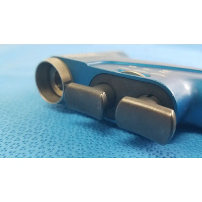 Blue plastic handheld stryker 6400-099 remb universal driver with black knobs and circular lens for reuse medical equipment