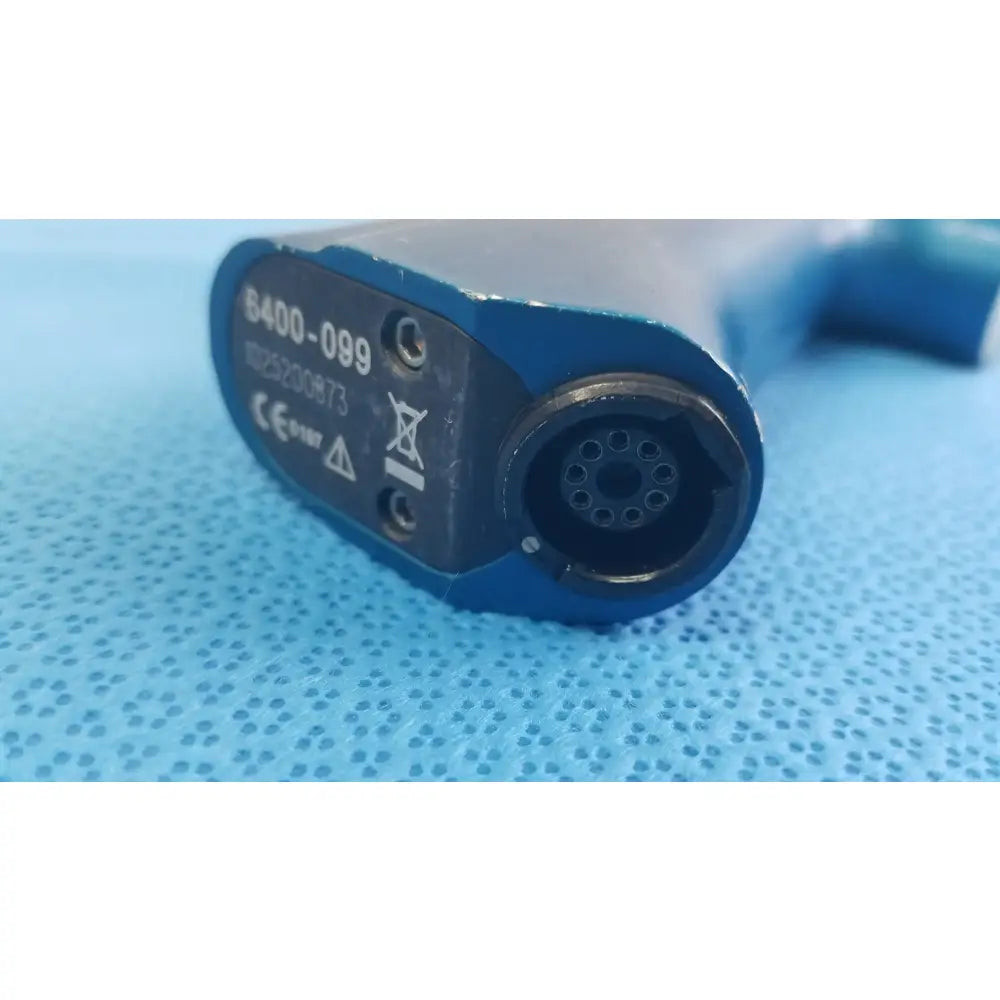Blue plastic stryker 6400-099 remb universal driver with circular port and serial number for reuse medical equipment in smiths medical