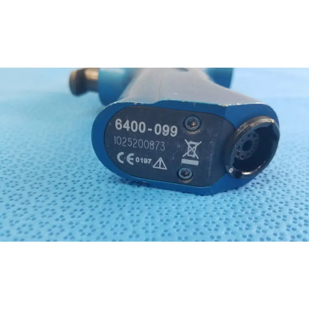 Blue and gray industrial air tool with model number 6400-099 black label for smiths medical reuse medical equipment