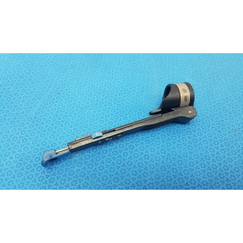 Stryker 6400-9 remb handswitch black plastic surgical instrument with blue-tipped handle and metallic components for reuse medical use