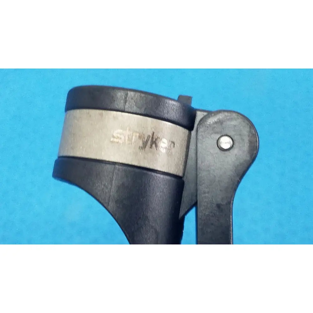 Stryker 6400-9 RemB handswitch with black plastic and metal handle and silver engraved brand band for reuse medical use