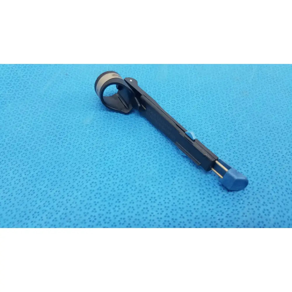 Stryker 6400-9 RemB Handswitch black and blue surgical clamp with textured grip handle for reuse medical applications