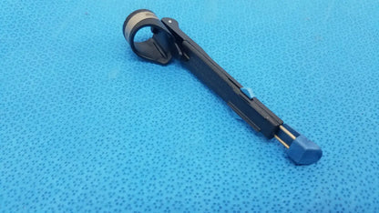 Stryker 6400-9 RemB Handswitch black and blue surgical clamp with textured grip handle for reuse medical applications