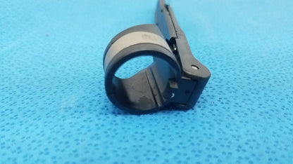 Black plastic Stryker 6400-9 remb handswitch clamp with silver band designed for reuse medical applications