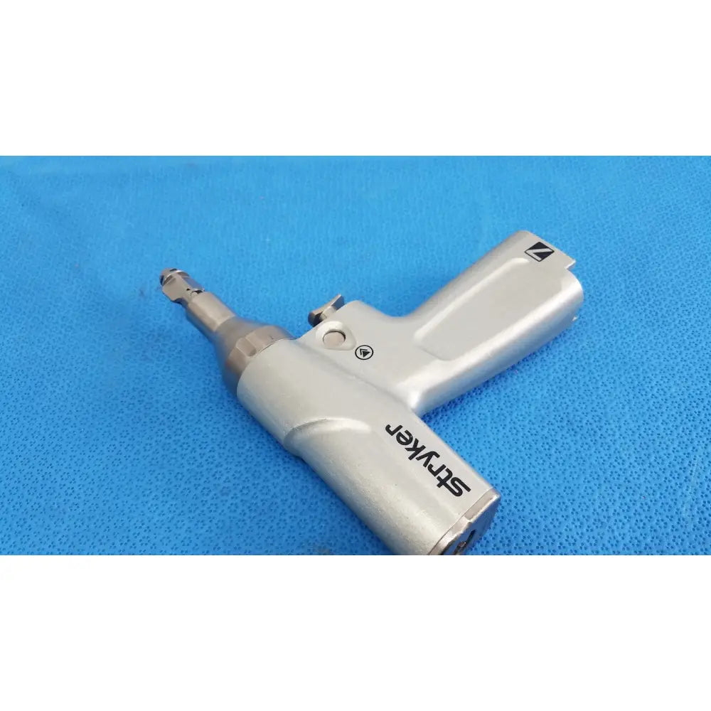 Stryker 7206-000-000 System 7 reciprocating saw handpiece with silver metallic ergonomic grip and precision bit for orthopedic instruments reuse medical use