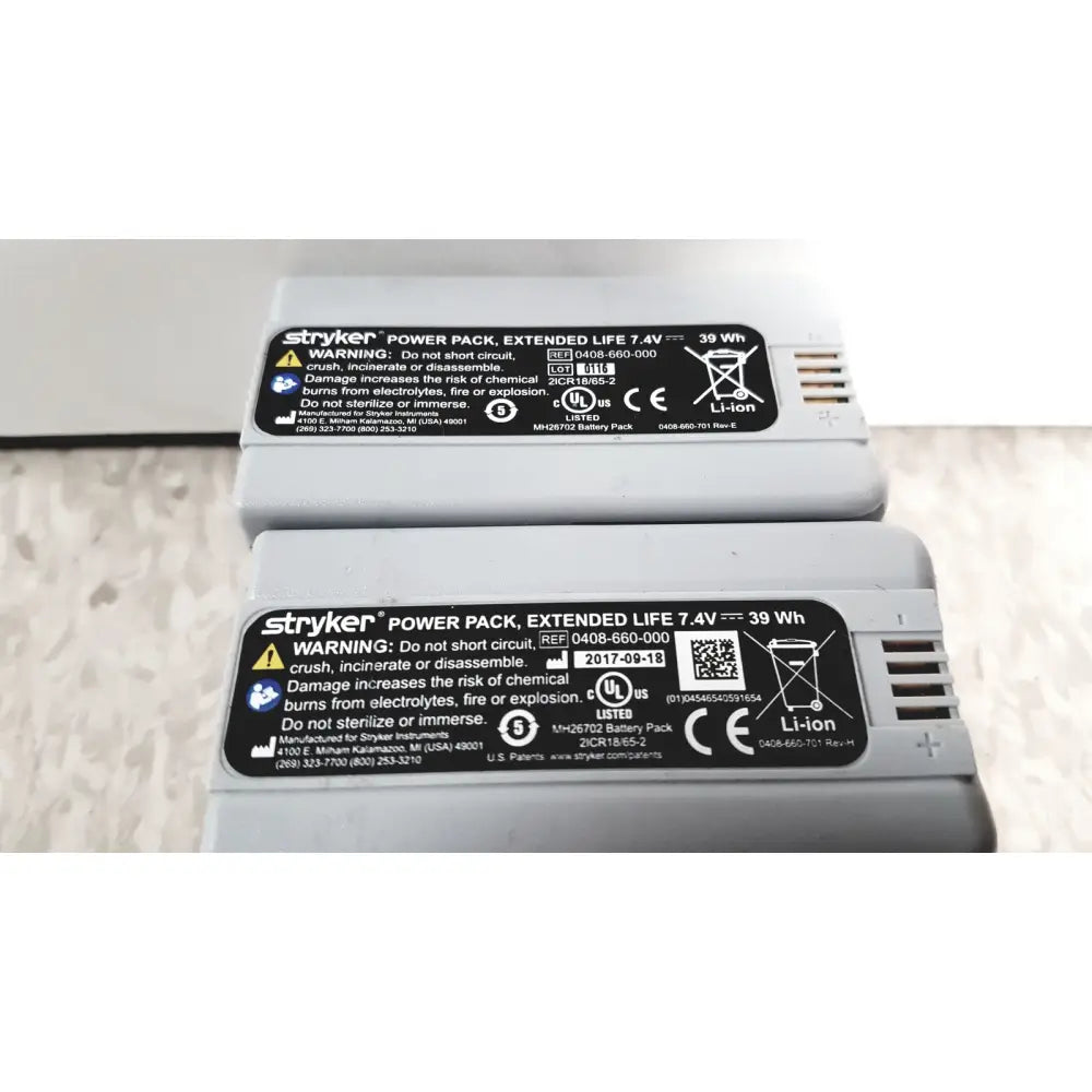 Gray rectangular stryker power pack flyte battery with black labeling for flyte battery charging station use