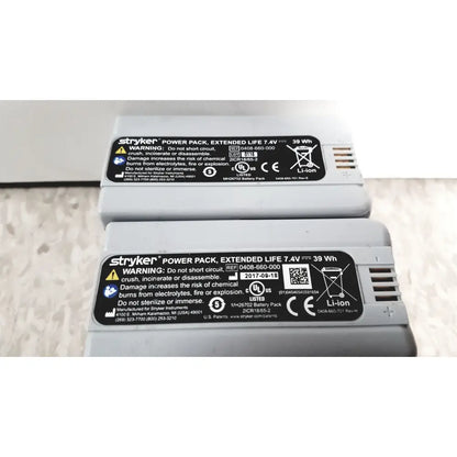 Gray rectangular stryker power pack flyte battery with black labeling for flyte battery charging station use