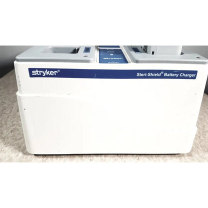 White stryker flyte battery charging station with blue branding and 8 slots for flyte battery charging use