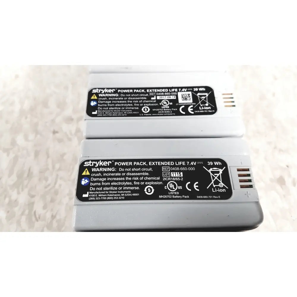 Gray stryker power pack battery with black label and white text for flyte battery charging station use