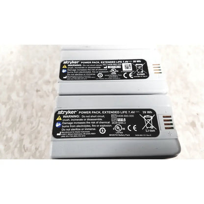 Gray stryker power pack battery with black label and white text for flyte battery charging station use