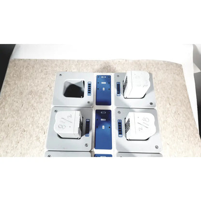White and blue modular sections of stryker 8-slot steri-shield flyte battery charging station 0408-655-000 flyte battery charging